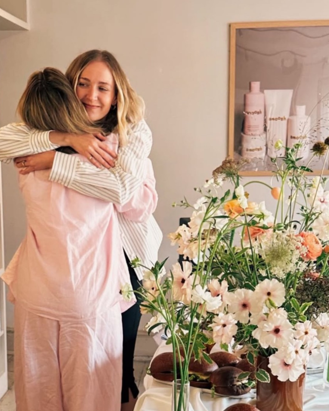 founders of smoosh have a hug at their first community event